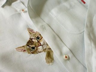 Illustration for article titled Internet Cats Make Boring Dress Shirts Better